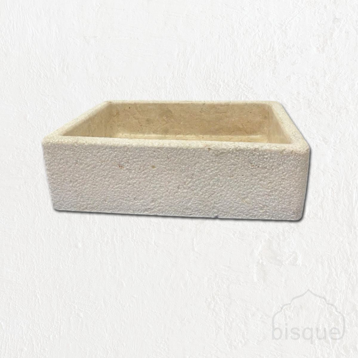 Basin: Bunte. Marble basin with rough finish
