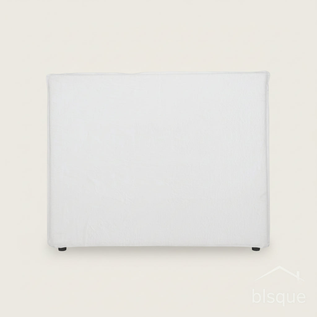white linen slip cover bedhead on white background