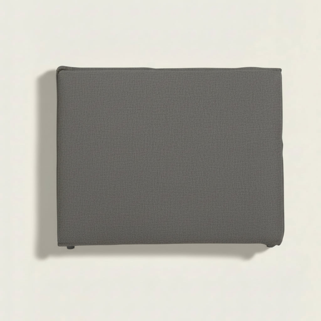 Grey slip cover bedhead on a white background