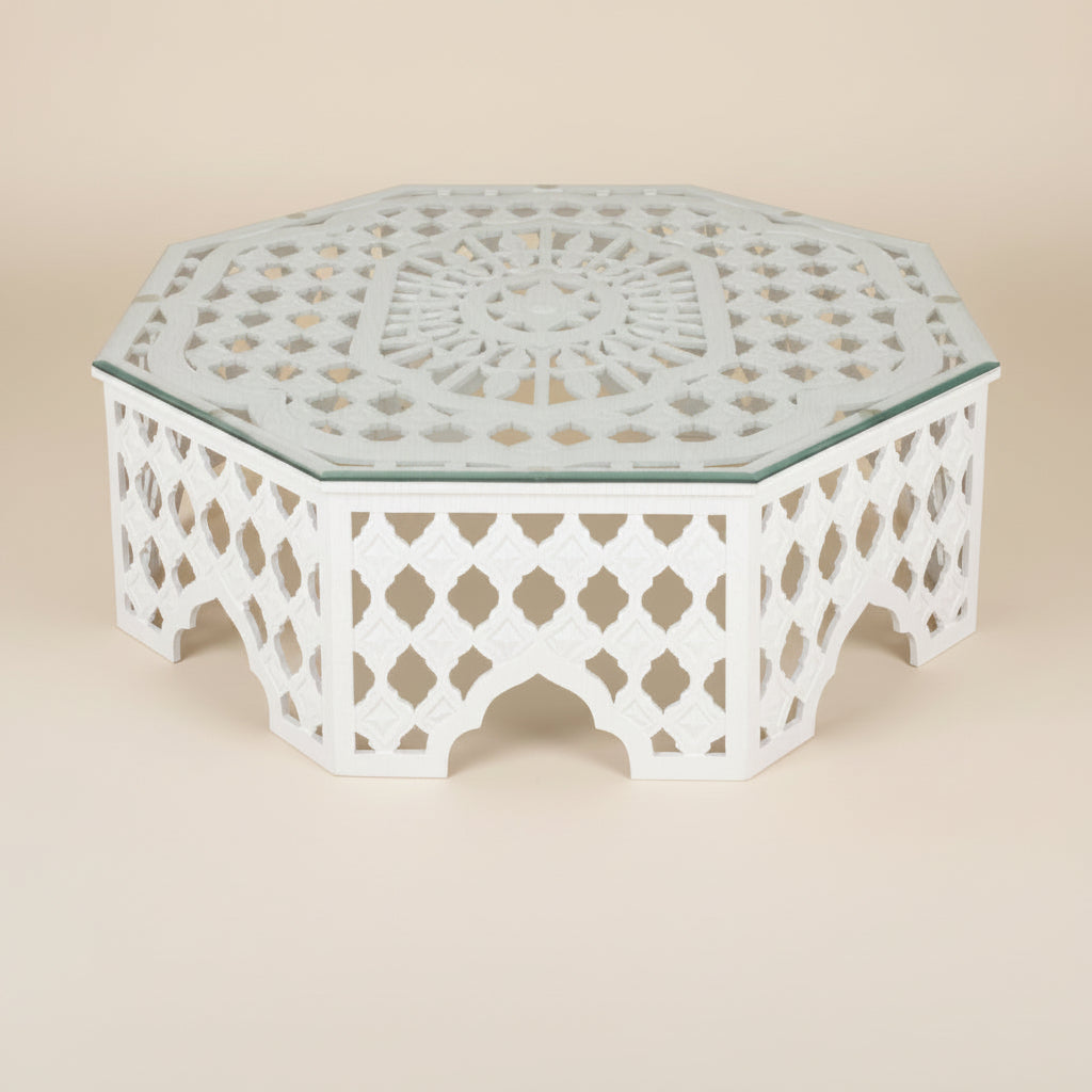 camilla white carved Indian octagonal coffee table with a glass top