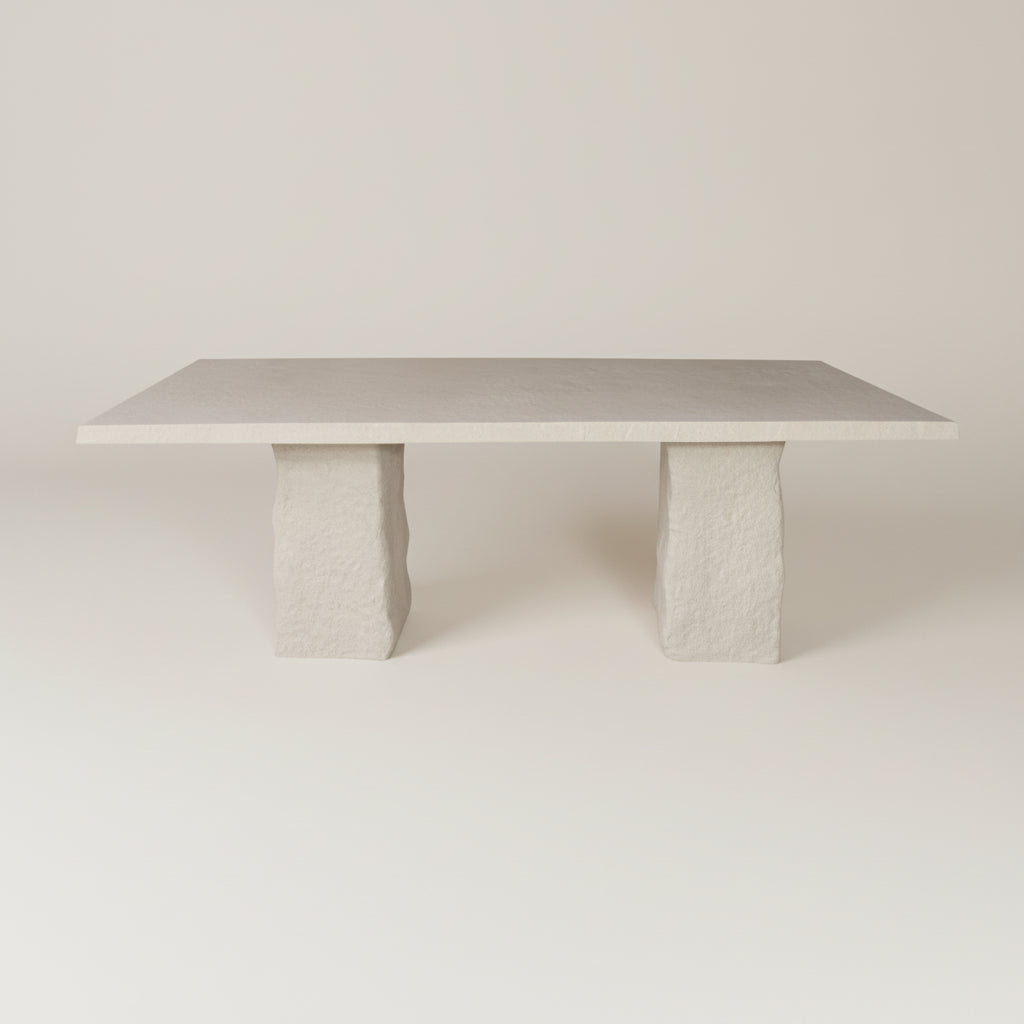 Concrete table with textured legs on a plain background, wabi sabi
Concrete table with textured legs on a plain background