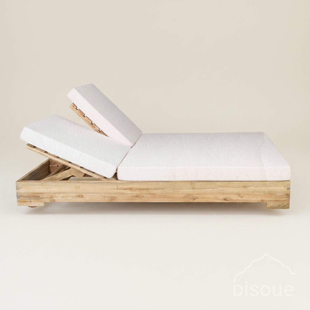 Teak bleached double sunbed with white cushions.