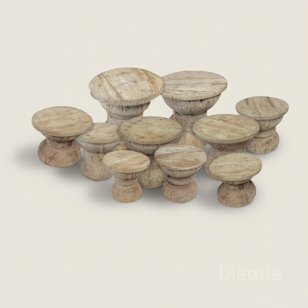 carved wooden okhali side tables, all unique