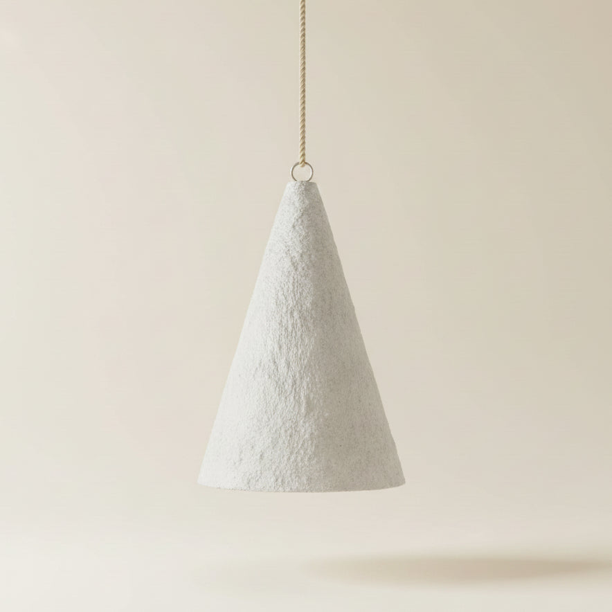 A textured cone-shaped paper pendant light, white, 70cm high, 40 cm wide. By Bisque Traders, Byron Bay.