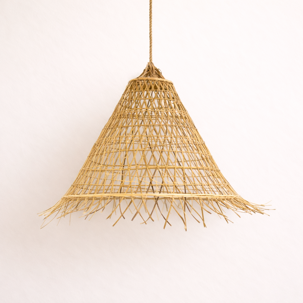 Woven rattan cone Bakara pendant light on a plain background