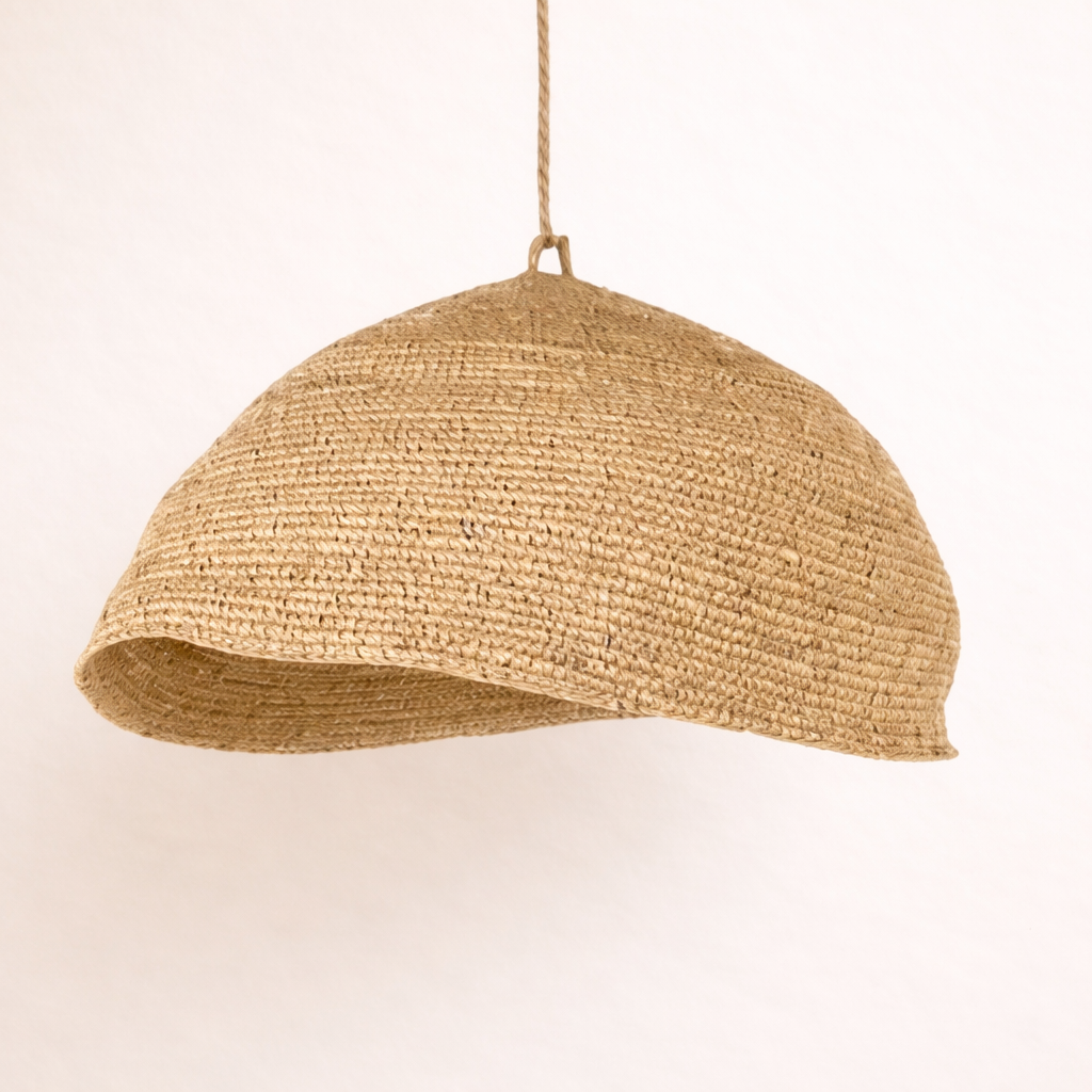 Woven Raffia Bulan unstructured large pendant light on a plain background