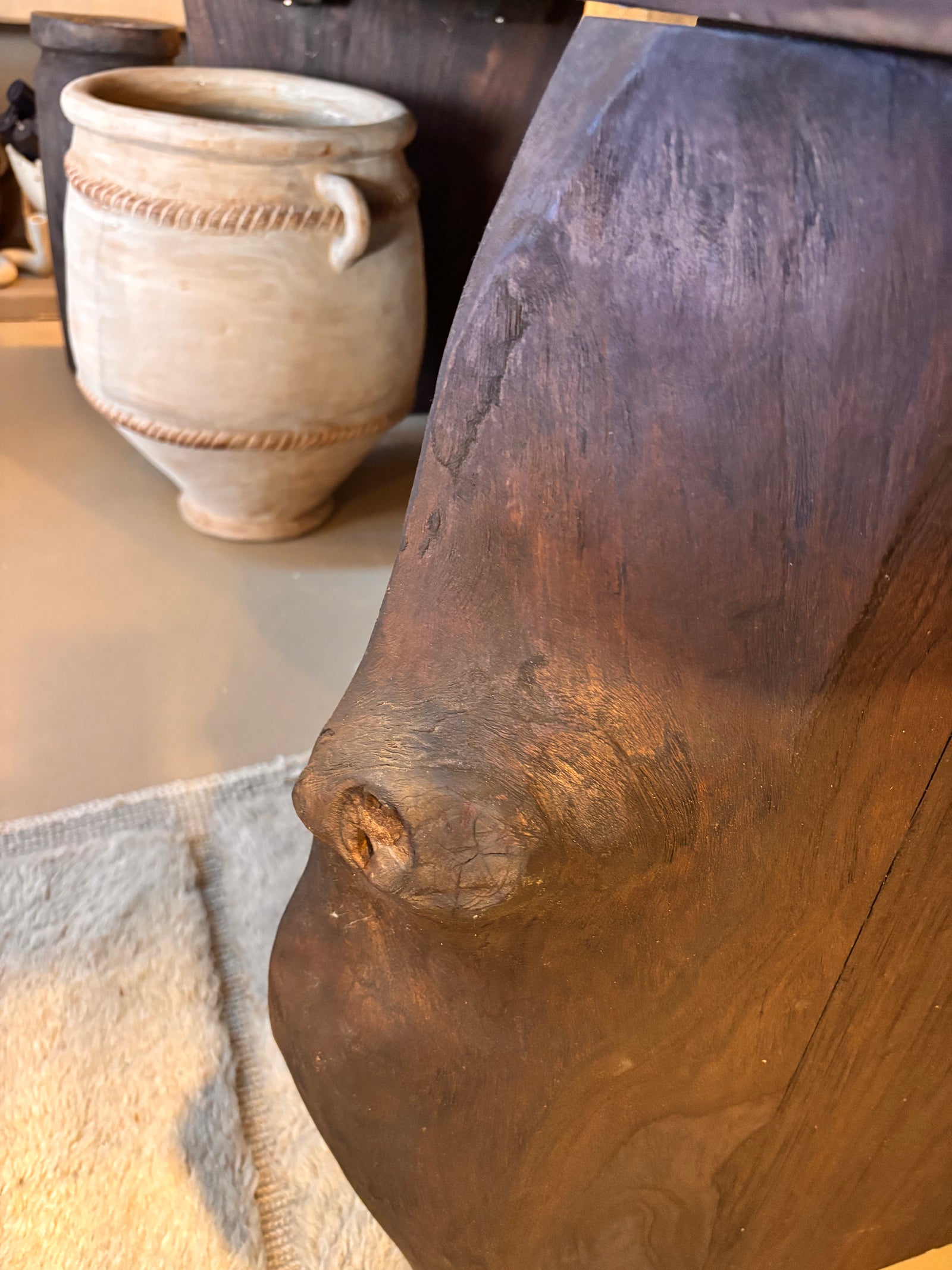 imola reclaimed teak 210 console detail of leg, bisque traders