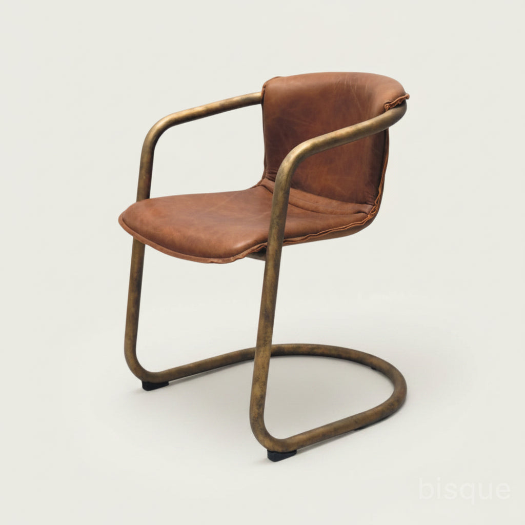 orlando tub style tan leather seat with bronze metal frame. bisque traders