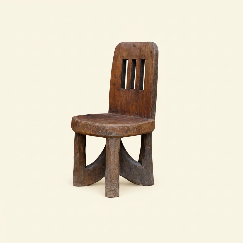 Peri Tribal accent chair, hand carved, wabi Sabi style.