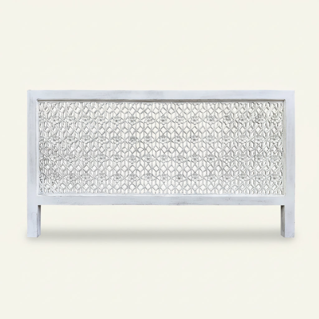 white carved wood bedhead on white background