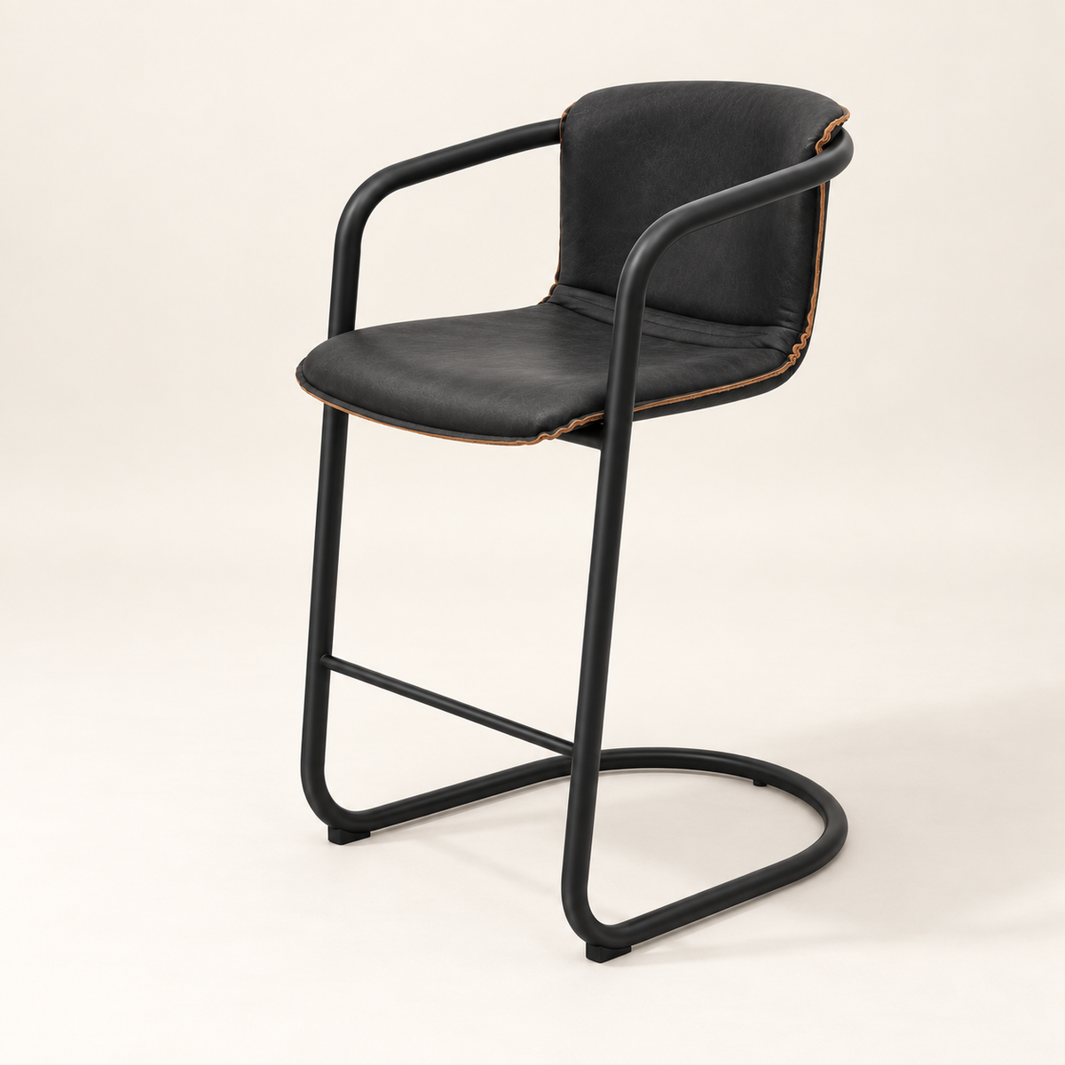 A modern bar stool with a black padded seat and backrest, supported by a black cantilever metal frame, shown against a light beige studio background.