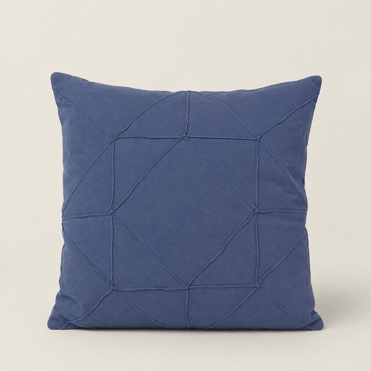 blue cushion with geometric quilted tufting