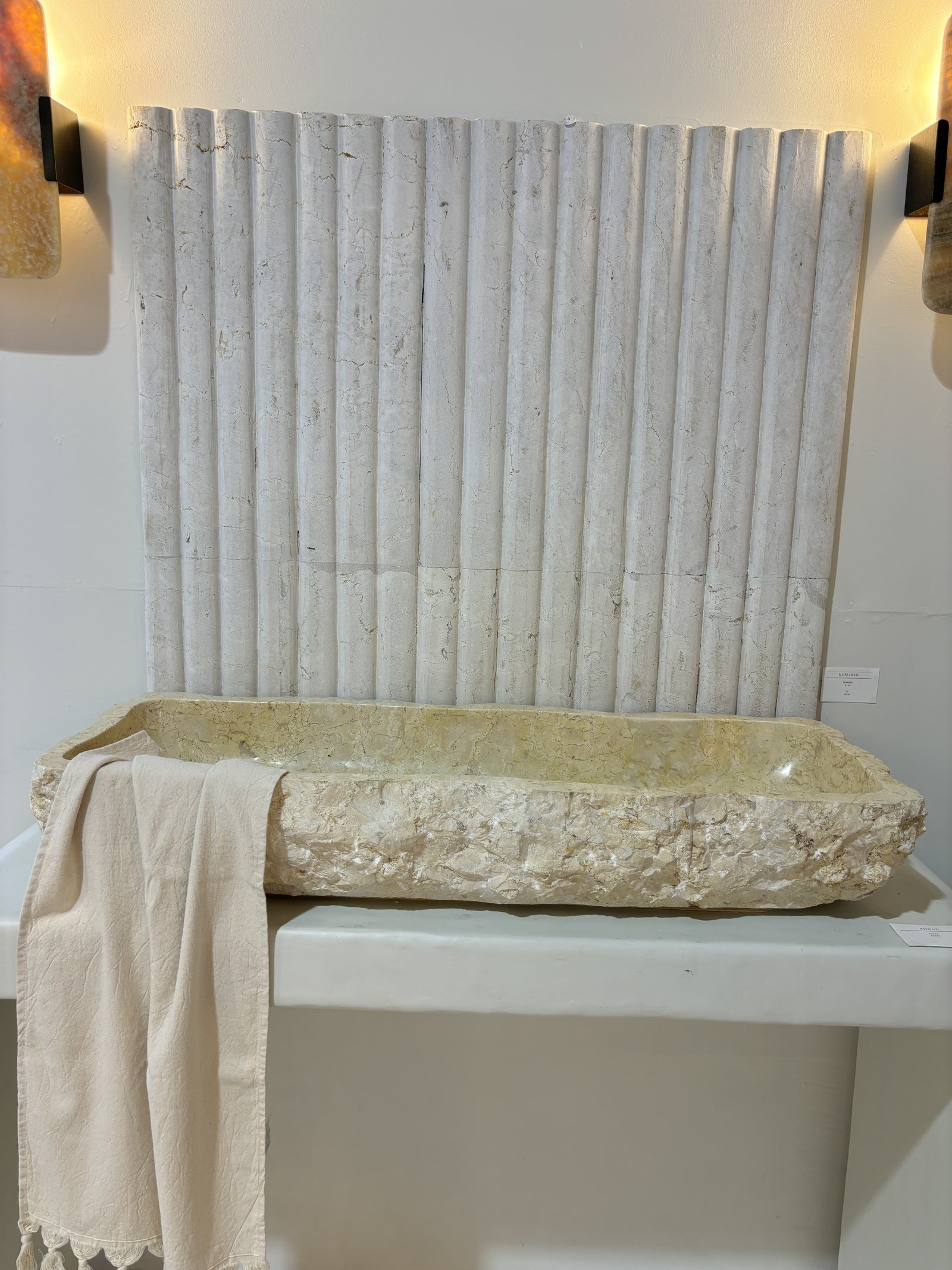 Yollam : long marble basin with rough finish