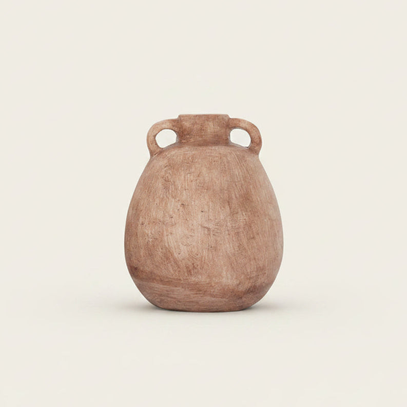 A rustic, earthy brown ceramic vase with two loop handles and a textured finish, centered on a light beige background.