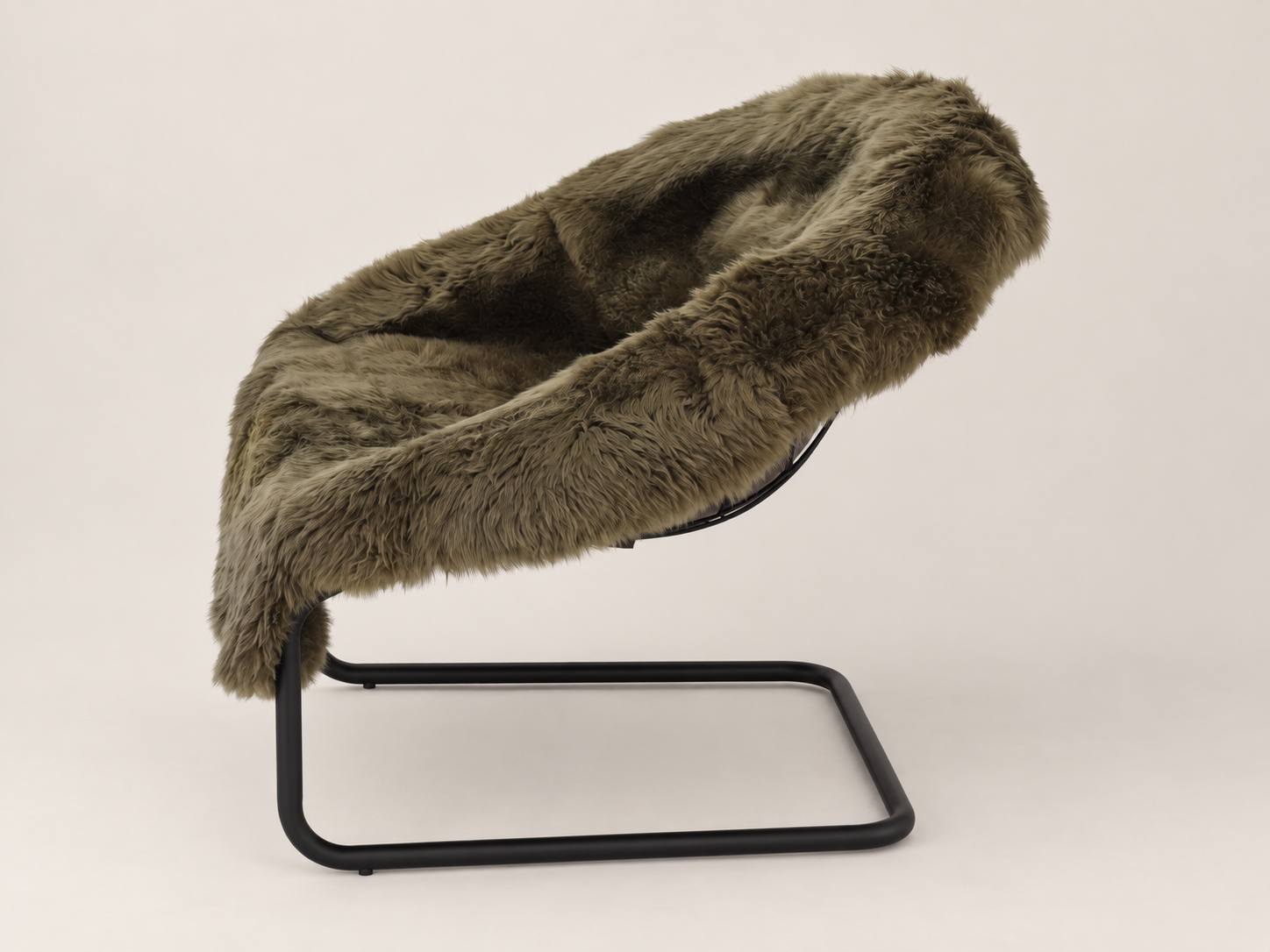 A modern lounge chair featuring a plush, shaggy faux-fur seat cushion in a taupe-brown color, supported by a minimalist black metal frame, set against a solid light beige background.