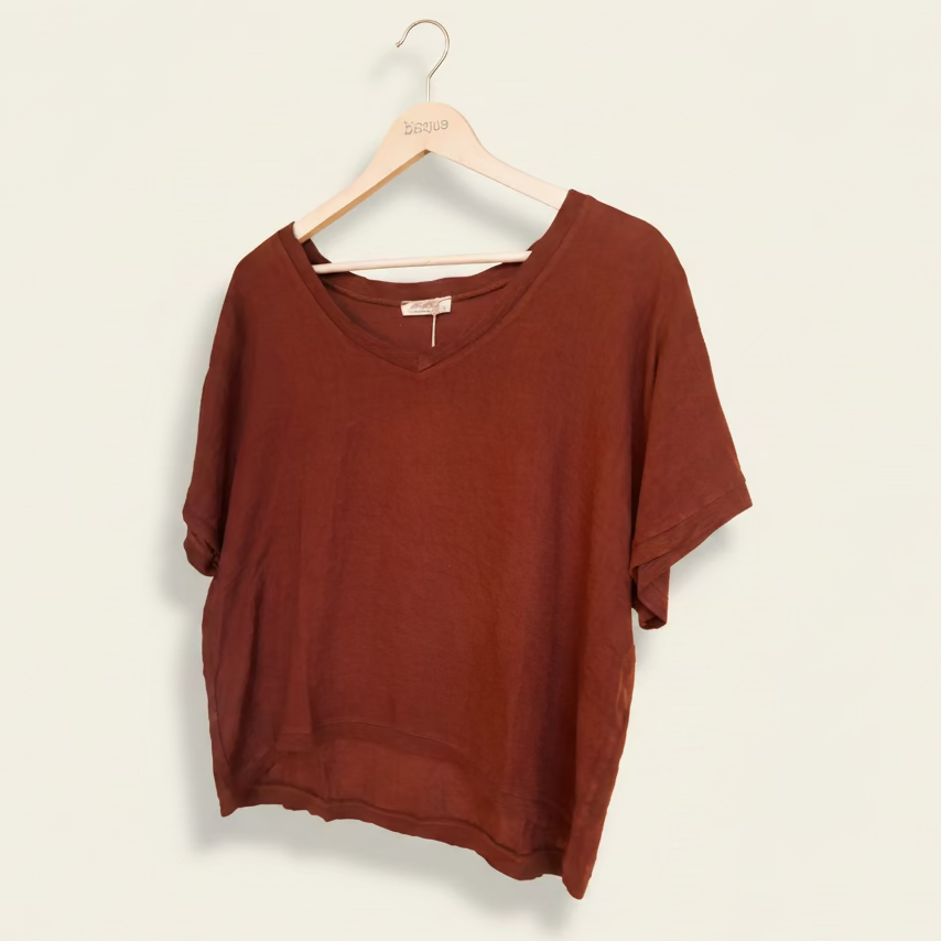 Brown Armonia 100% Italian linen shirt on a hanger against a white background