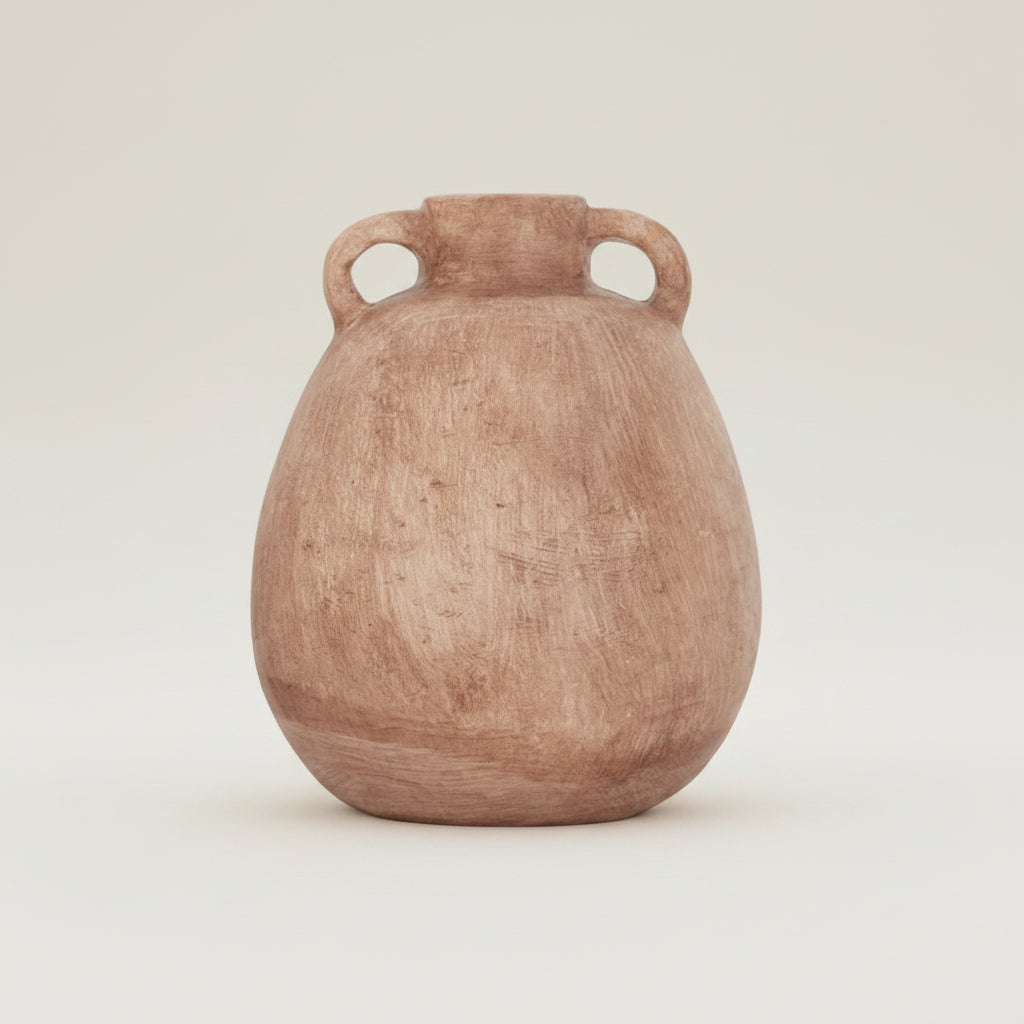 Brown ceramic vase with handles on a textured beige wall