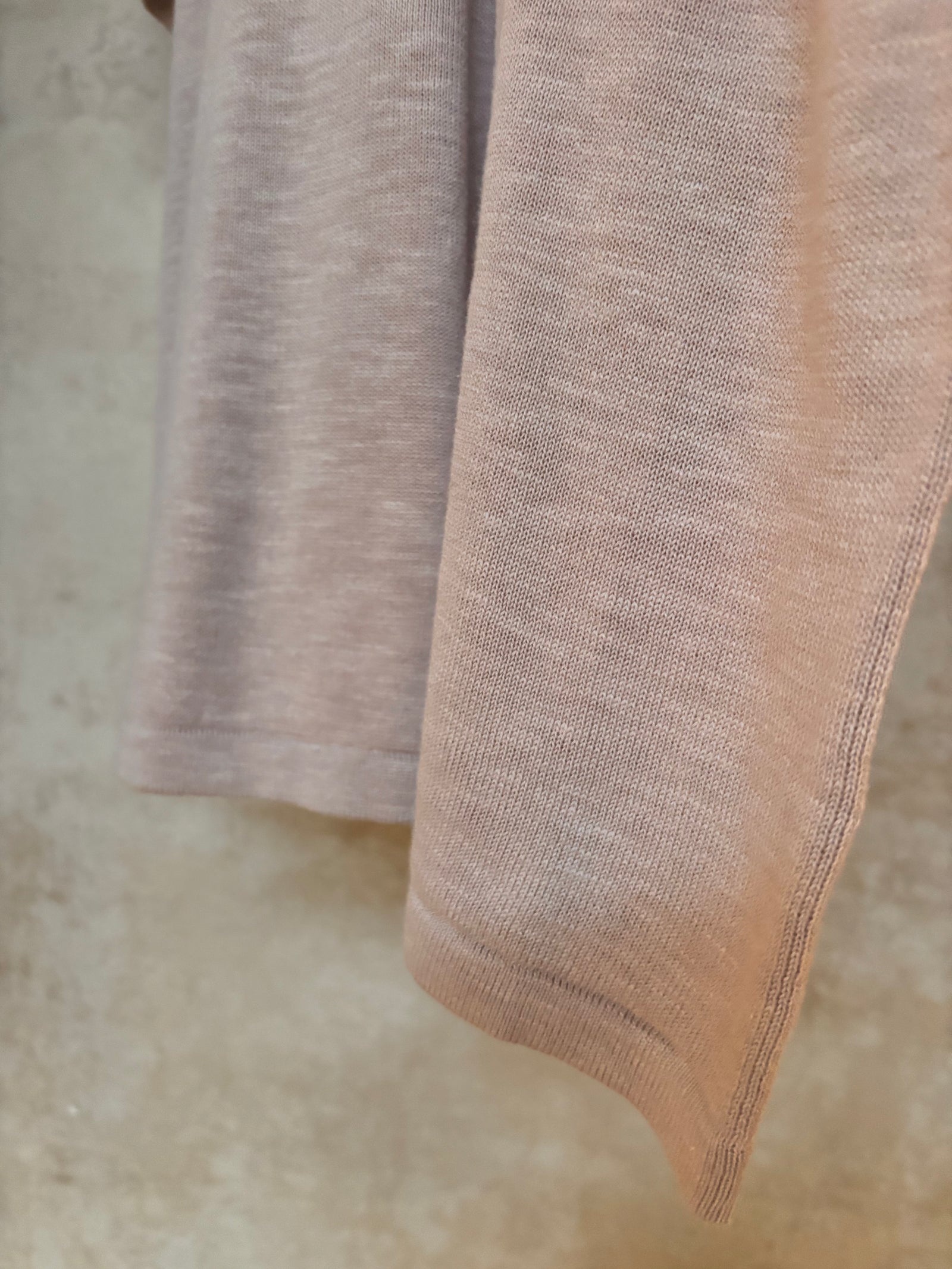 Close-up of a brown fabric on a beige background