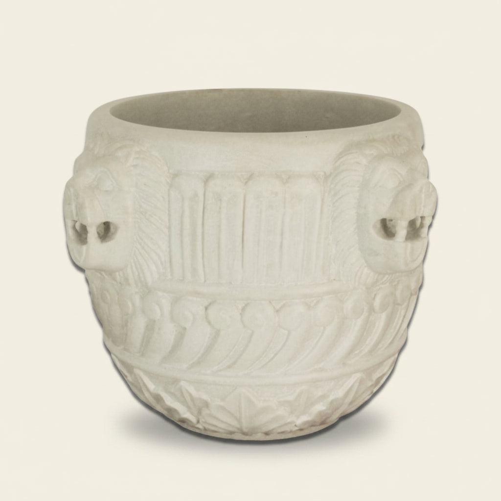 Lion face carved marble basin