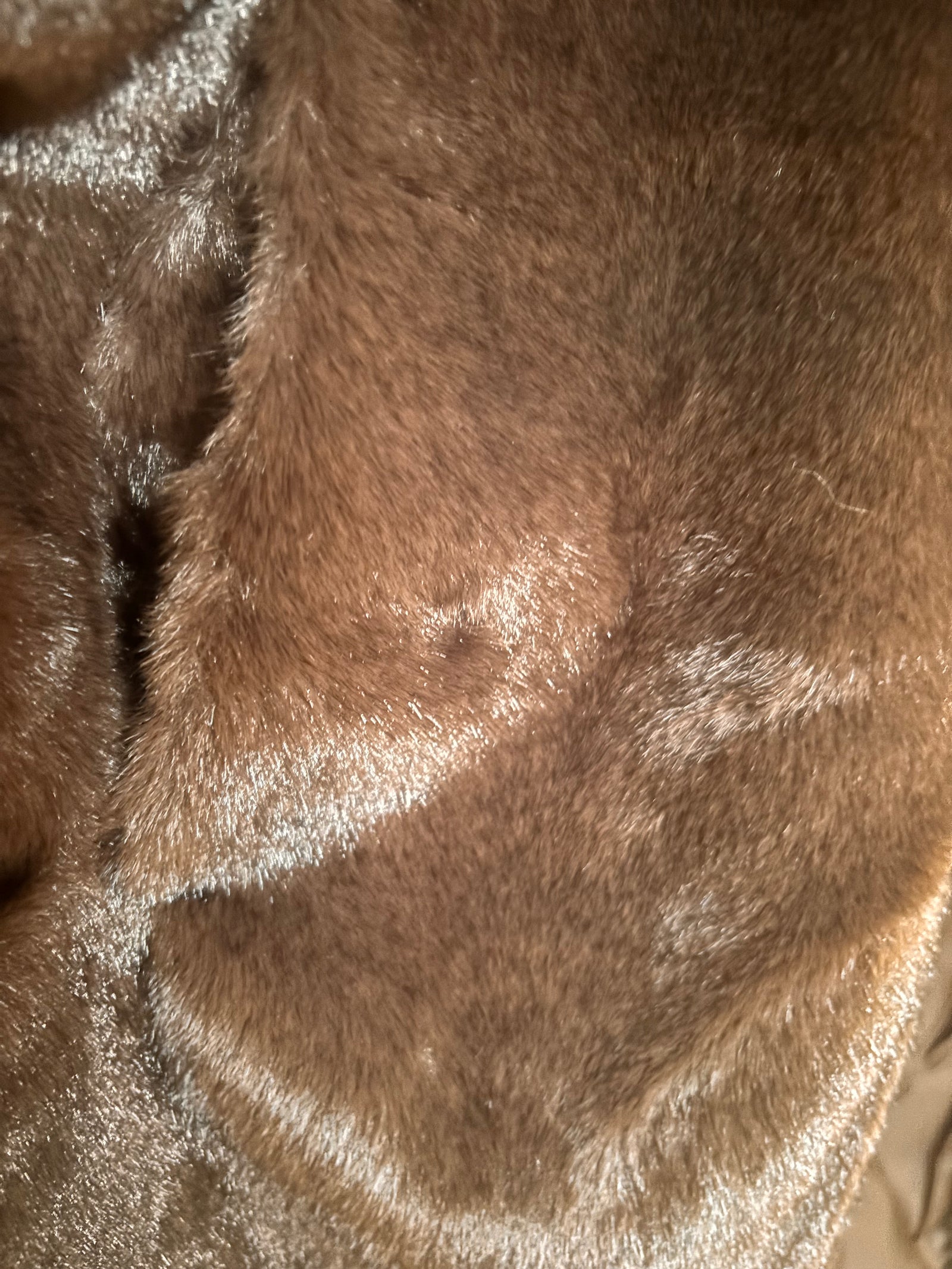 Close-up of brown faux fur Margo coat texture
