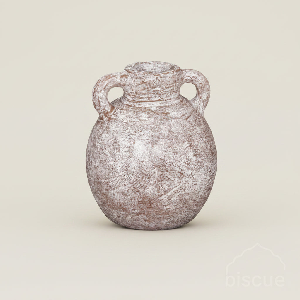 A rustic, textured ceramic vase with two loop handles and a short neck, shown against a solid light beige background.