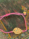 Tear drop souk pendant on adjustable fluro pink silk string